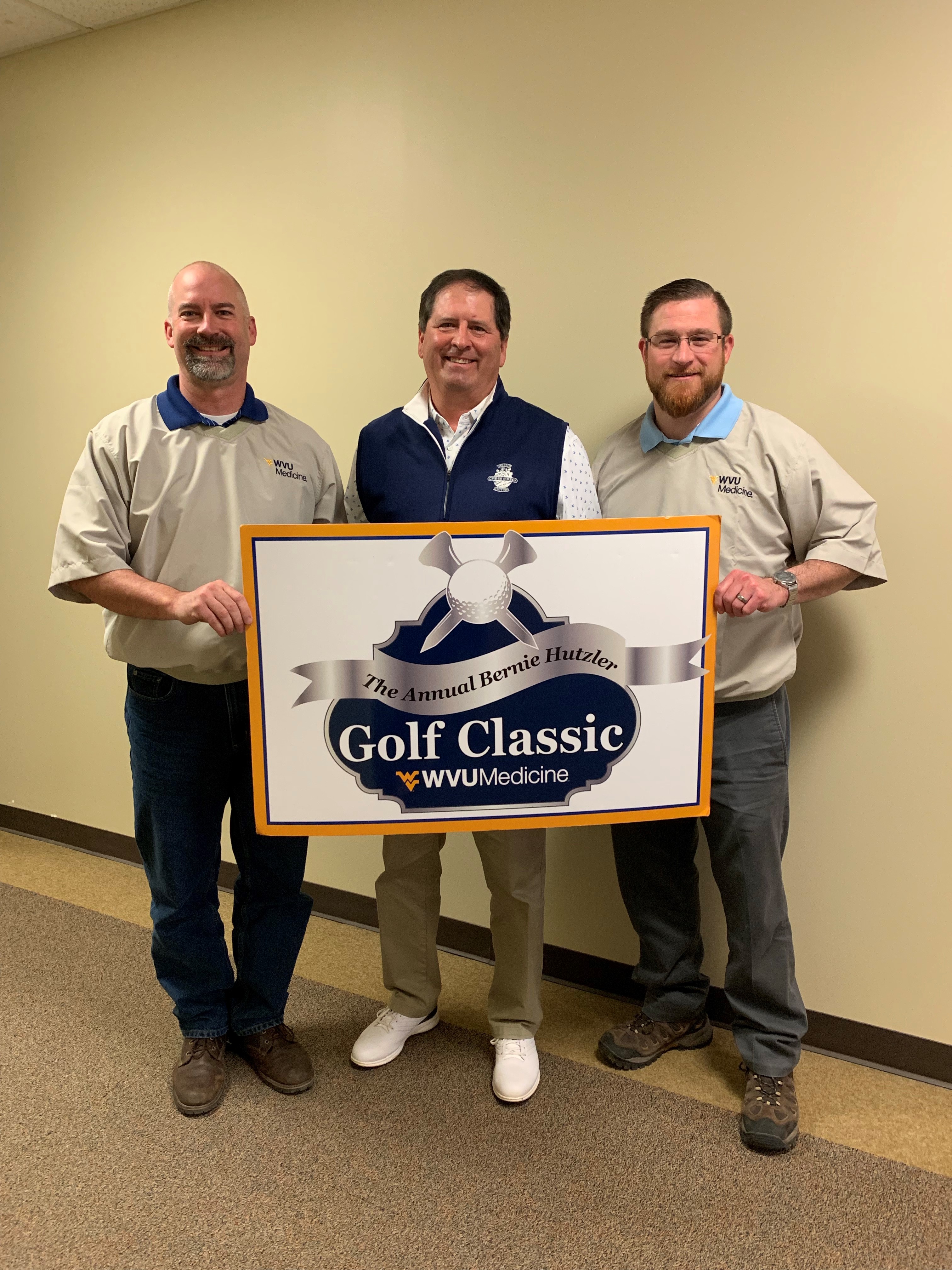 2019 Bernie Hutzler Golf Classic Co-Chairs C. D. Linton (left) and Scott Mathis (right) are pictured with Cress Creek Golf Pro John Francisco (center).