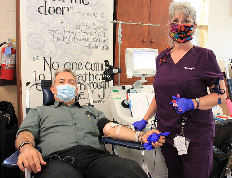 Skip Gjolberg, administrator of WVU Medicine St. Joseph's Hospital, donates blood.