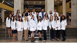 Biomedical Laboratory Diagnostics program holds white coat ceremony, celebrates students entering clinical practice 