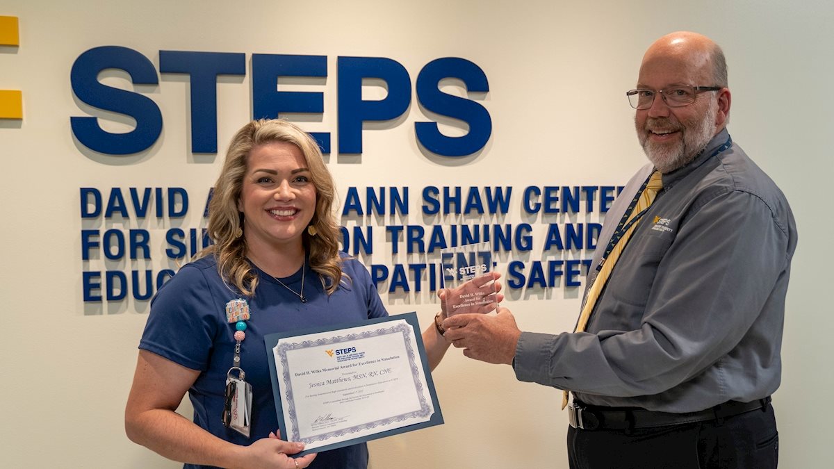Matthews honored with Wilks Award for excellence in simulation education