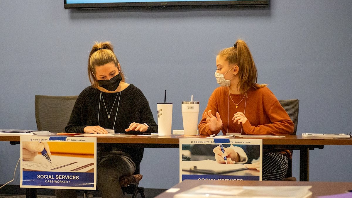  Public Health students volunteer during poverty simulation to facilitate deeper understanding of health disparities