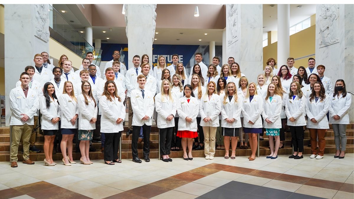 The Class of 2025 receives white coats at special ceremony School of