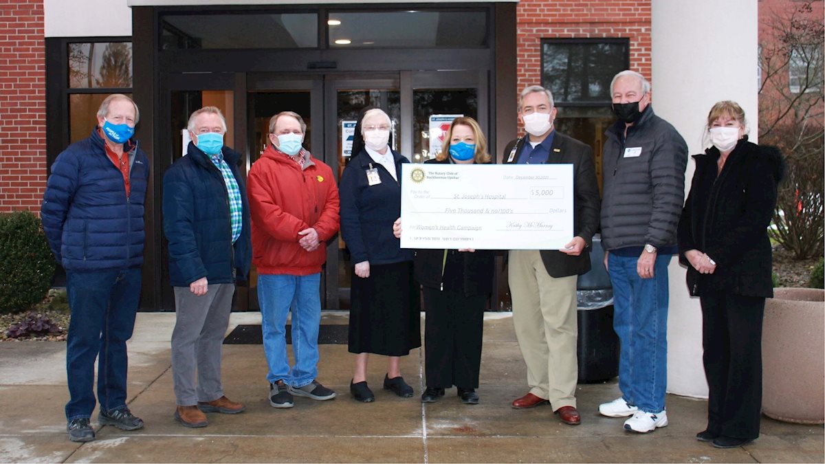 The Rotary Club of BuckhannonUpshur presents donation to St. Joseph’s