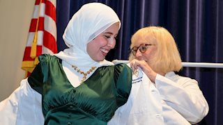 WVU dental students receive white coats, celebrate transition to patient care