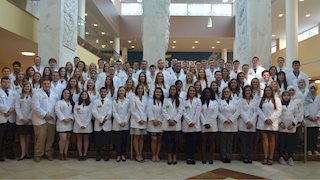 WVU Pharmacy students receive white coats