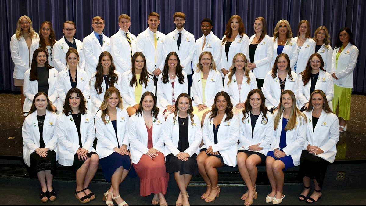 WVU School of Medicine Occupational Therapy students receive white coats, begin clinical rotations