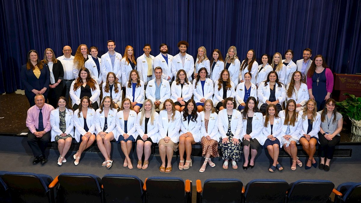 WVU School of Medicine Occupational Therapy students receive white coats, begin clinical rotations 