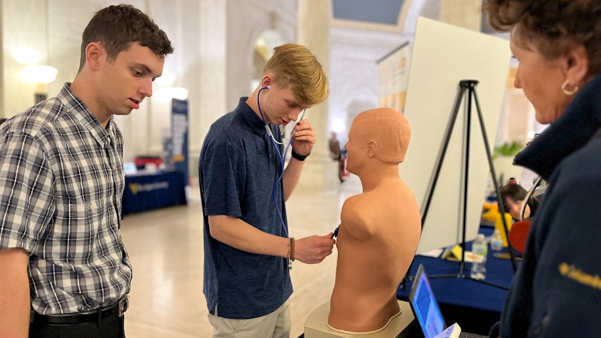 WVU School of Nursing faculty offer interactive heartbeat display at WVU Day at the Legislature