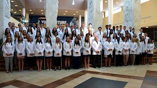 WVU School of Pharmacy first-year students receive white coats