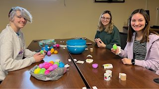 WVU Student Nurses Association and A Moment of Magic fill Easter eggs for WVU Children’s Hospital