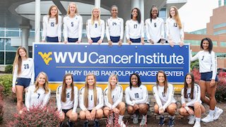 WVU volleyball team participates in “Set for a Cause, Spike for a Cure” to benefit cancer research