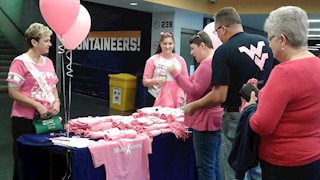 WVU volleyball team scores win and raises breast cancer awareness 
